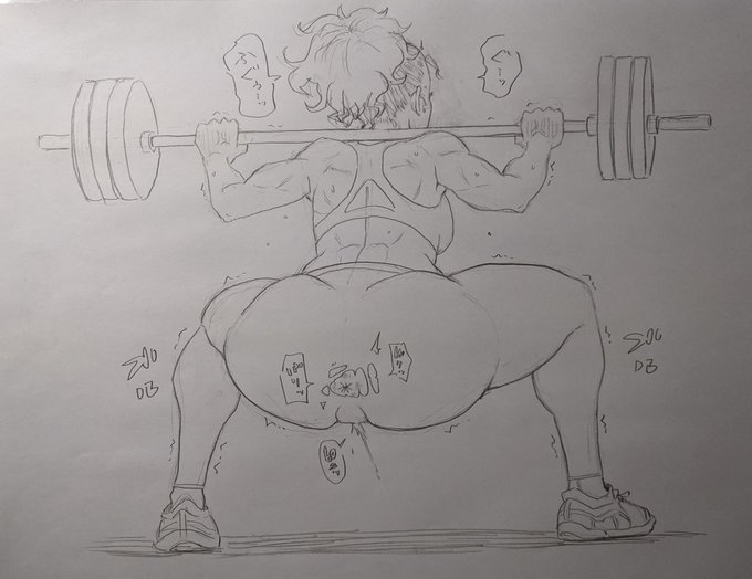 バーベルを持ち上げようとする筋トレ女子。 