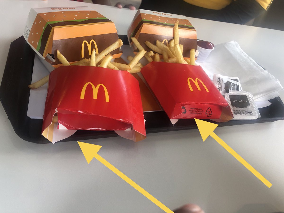 Sanzab_'s tweet photo. @McDonalds_SA is this how you want to save at the expense of the customers. Why is you container of the chips like this? Why is it folded at the bottom to a point that is torn. Please McDonalds make me understand. I paid a lot of money to be cheated on like this. https://t.co/fTGoc5o5jC