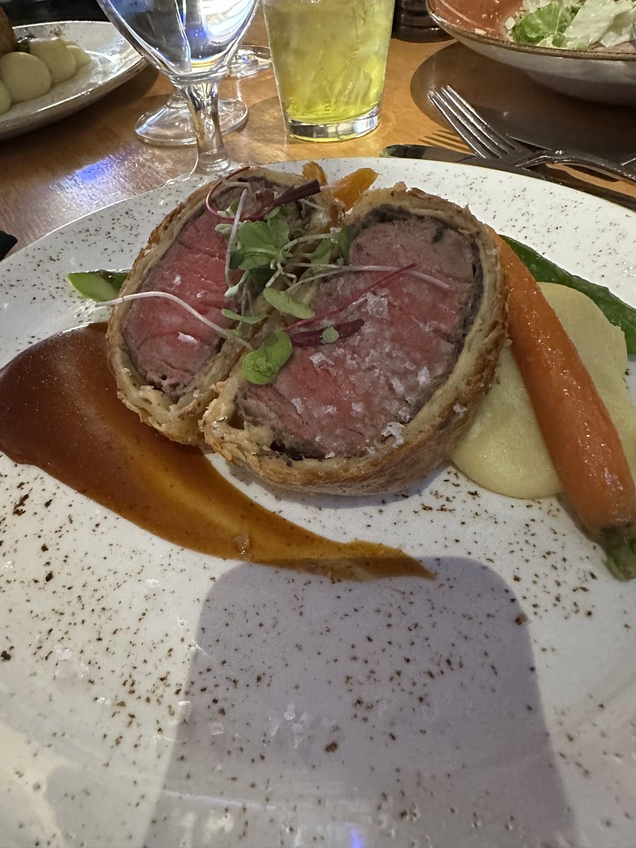 Fansieface's tweet photo. I finally tried a beef Wellington at Gordon Ramsay Pub and Grill in Vegas. I will say… the ceasar salad was good? Did not love the Wellington ☹️😖 https://t.co/s1x8pSsYcV