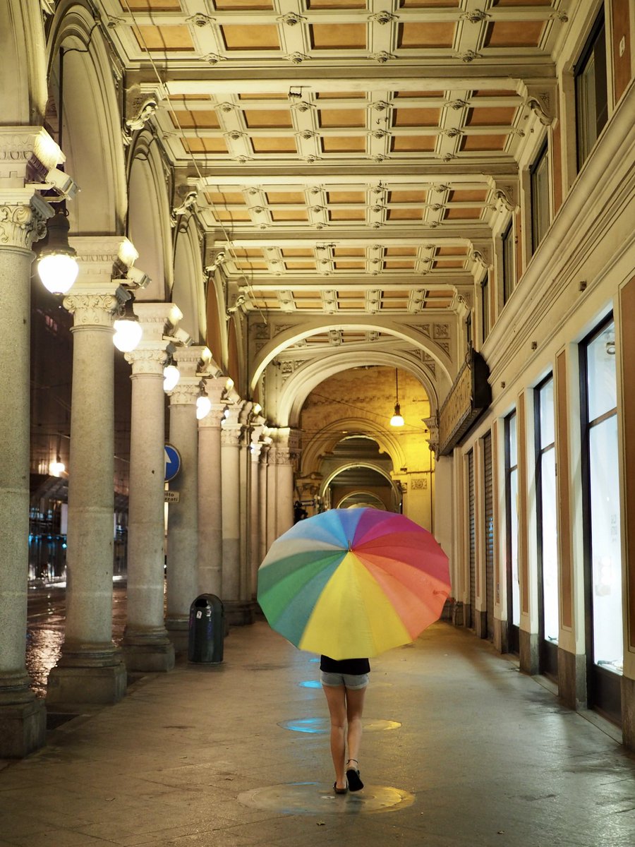 A rainy night with a rainbow umbrella 🌈☔️ 

📍Via Pietro Micca -Torino

#163/23 #umbrella #rainbow #night #rain #rambling #torino #turin #torinoèlamiacittà #torinoècasamia #lucatorino #onailgatoeg #mypov #turinitaly #lamiatorino #diariotorino #urbanlandscape #street