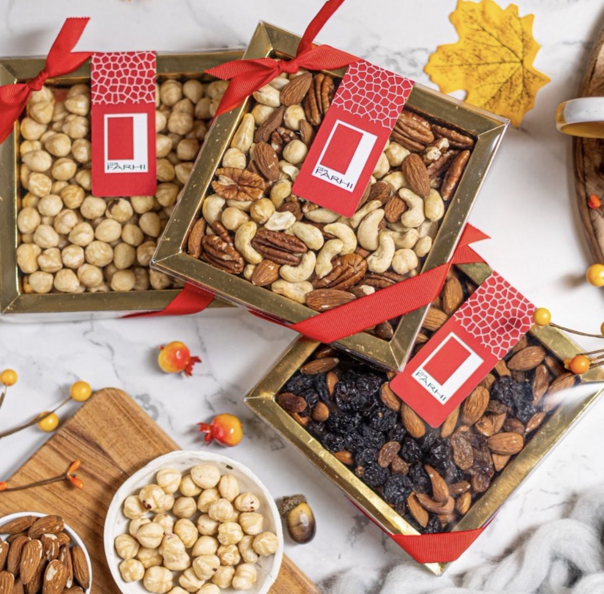 Getting ready for Autumn with our warm nut selection 🍂⁣

All of our nuts are hand-picked and sorted, to make sure that only the finest ones make it into our gift boxes.

Do you prefer our gold or red gift box?

#Farhi #nuts #hazlenuts #raisins #nutselection
