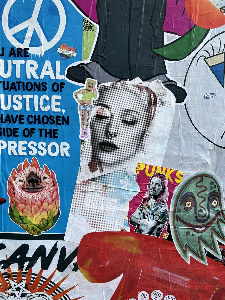 When life gives you rainy days, wear cute boots &amp; jump in the puddles. Spent the day exploring the London International Street Art Festival, even the rain couldn’t hide the beauty of my urban angel art pieces. 🌧️ #ArtInTheRain #LondonStreetArt #londoninternationalpastefestival