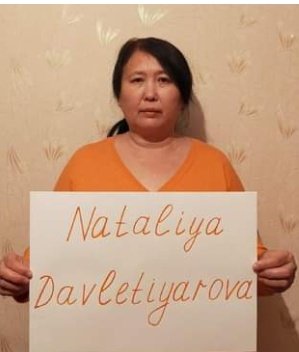 AiaKaz's tweet photo. This is how we participated in the @UN human rights action & took photos in orange. The authorities reacted promptly: they took note of the civil activists and illegally applied criminal punishment under #Art405 for extremism. @hrw @rightsmetrics @Left_EU @CanEmbKZ @nickbrousseau https://t.co/2ERI3K9nUm