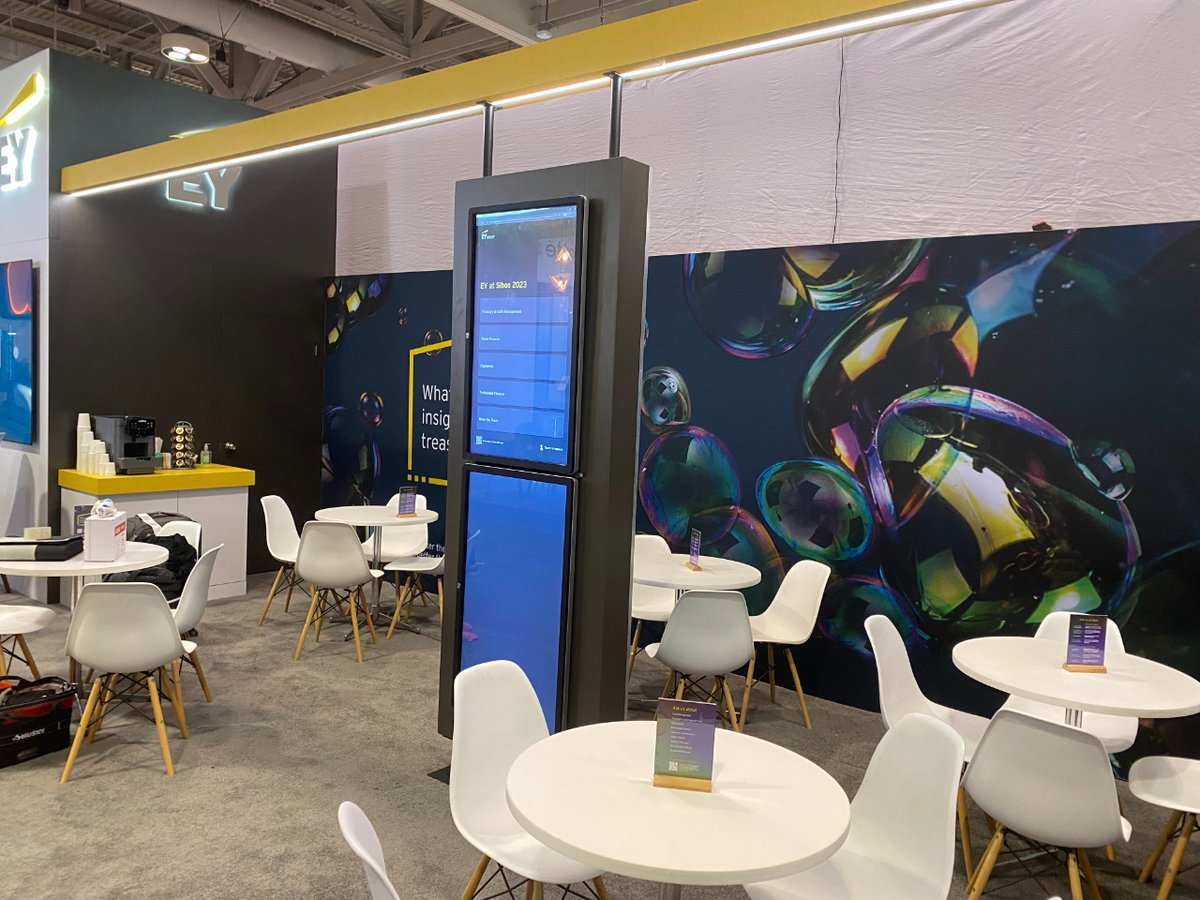 MaverickExhibit's tweet photo. 🙌 Today our client is unveiling their new custom, interactive exhibit at SIBOS 2023. This exhibit includes many interactive elements including a vending machine and touchscreens as well as 5 meeting areas. #sibos2023 #sibos #tradeshowdesign #exhibitdesign #exhibitinstallation https://t.co/qHb69cYwbQ