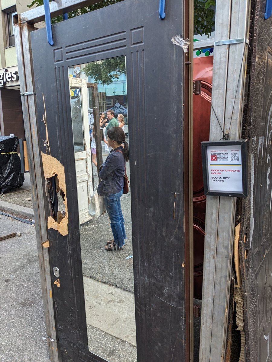 stuartma's tweet photo. @IAPonomarenko I saw this as a part of a display at the Toronto Ukrainian Festival over the weekend &amp; thought of you &amp; Bucha. They had damaged and destroyed doors from across Ukraine. Moving installation https://t.co/KfQrXLtnzI