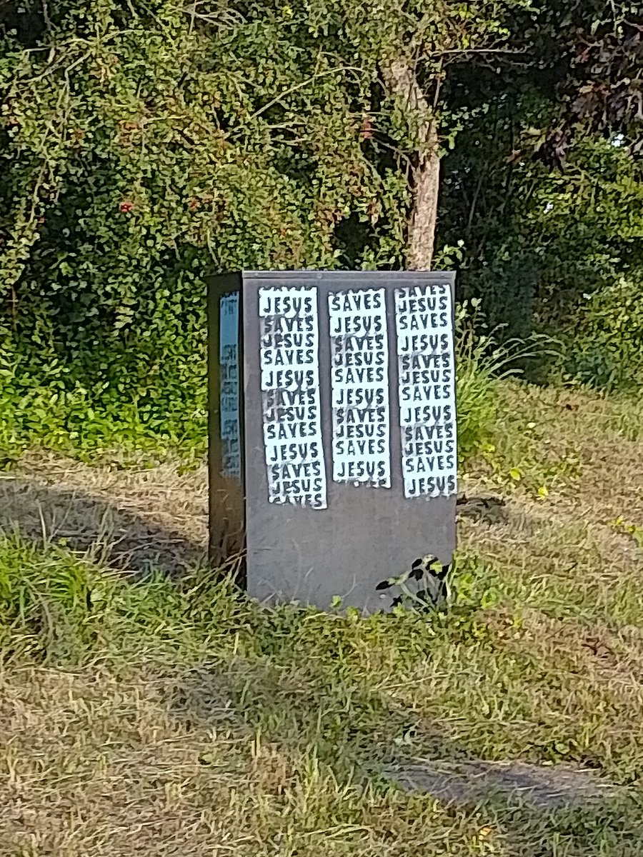 Local evangelistic graffiti spotted on the roadside while out and about this evening. (Photo taken from the passenger seat, I wasn't driving.)