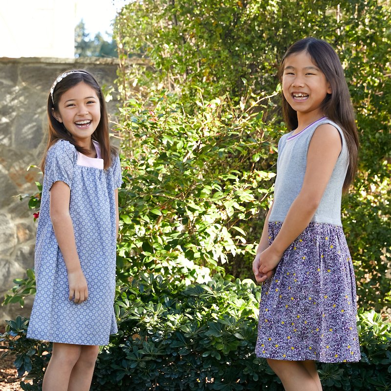 Smiling our way into a new week 😊 How #cute are these two 💙 Miss M in the Isla #dress in blue + Miss E in the Orla dress in gray. Our dresses are 100% #cotton + oh so comfy! edenandzoe.com/collections/gi… #fashion #kids #kidswear #happymonday