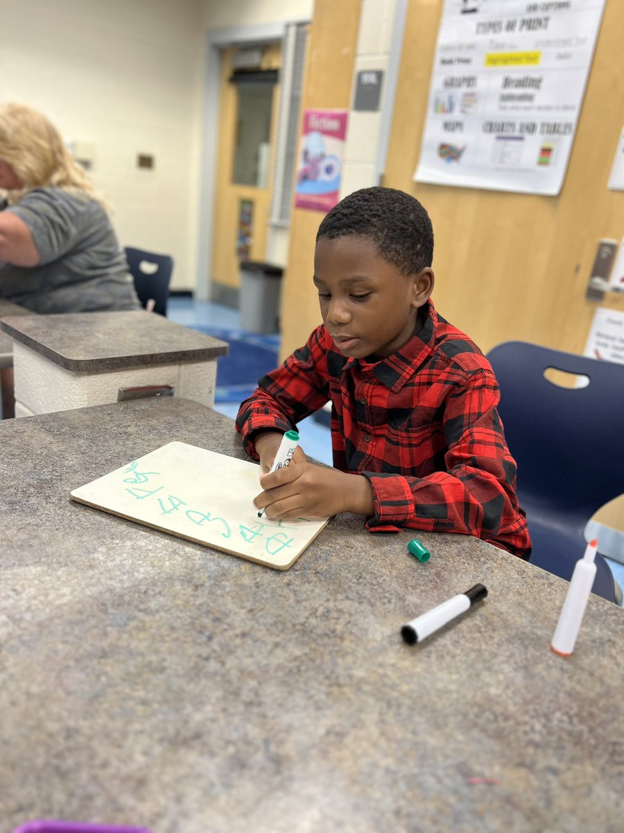 Around the building today:
💙 Firsties discovering new vocabulary 
💚 5th graders using the Standards of Mathematical Practice 
💙 Firsties reading and writing in library
