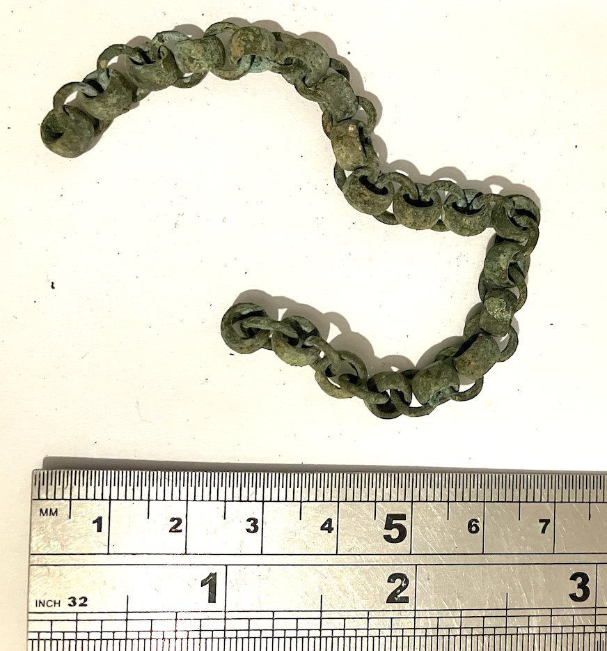 Found these artefacts inside the wall of an old cottage today, the comb looks to be cut from bone, anyone date them ?