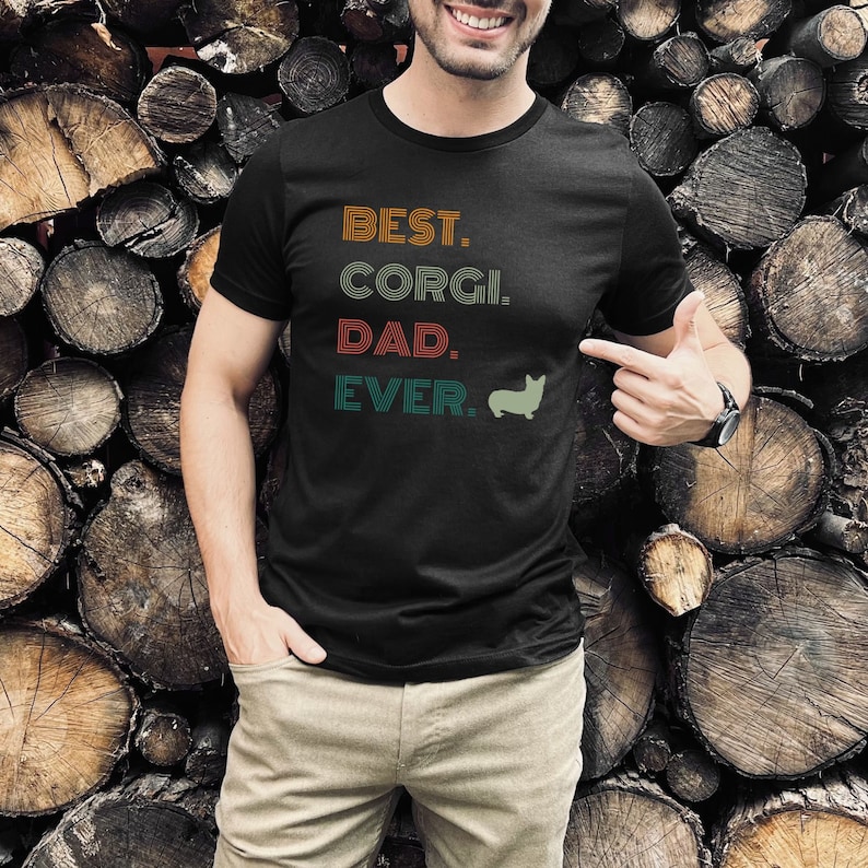 🎉 Show off your love for your four-legged fur babies with our "Best Corgi Dad Ever" Shirt! 
🛍️ Shop now at Splootville: etsy.com/shop/splootvil…
#CorgiDad #BestCorgiDad #CorgiLove #CorgiLife #DogDad #CorgiTee #SplootvilleFashion