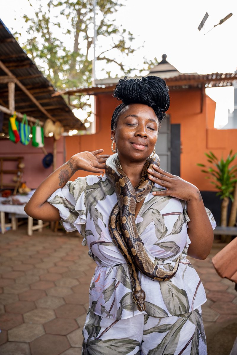 magicandmelanin's tweet photo. Venturing into the sacred #PythonTemple in #Ouidah, #Bénin, was a spiritual journey like no other. We experienced the deep spirituality of the Béninese culture, and found protection and good fortune wrapped in the embrace of these revered animals. 🐍✨ https://t.co/FBLXBoNAgW