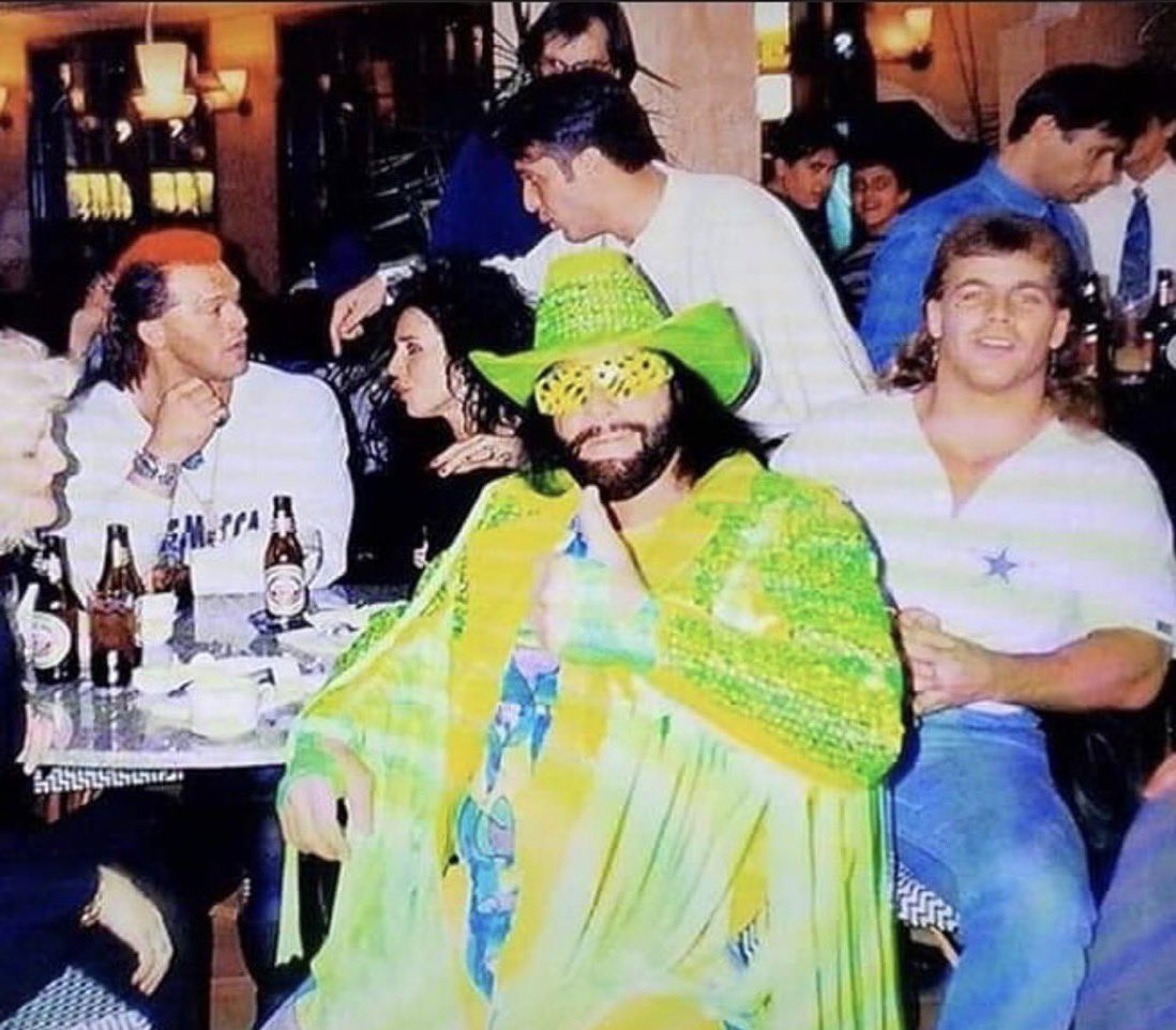 80sWWE's tweet photo. You might be cool, but you’re not Macho Man Randy Savage in full ring gear at the bar cool. 

Nobody is. https://t.co/k5RmUDU8mx