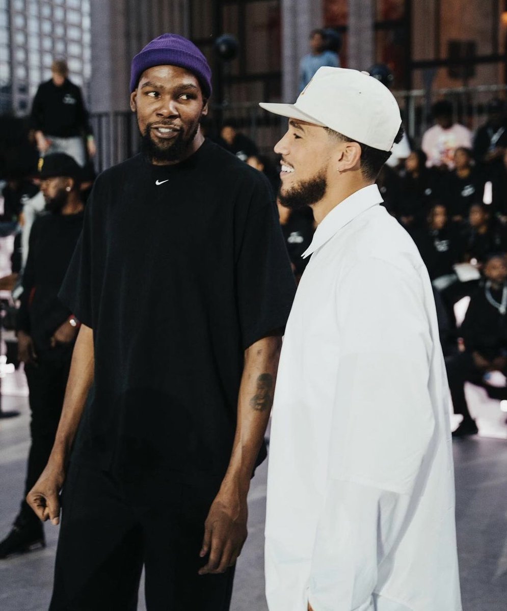 AndrewLeezus's tweet photo. Kevin Durant and Devin Booker are Phoenix Suns man. Blessed. 

36 days until Opening Night for 36 Unbothered https://t.co/ePMWQEqc0L