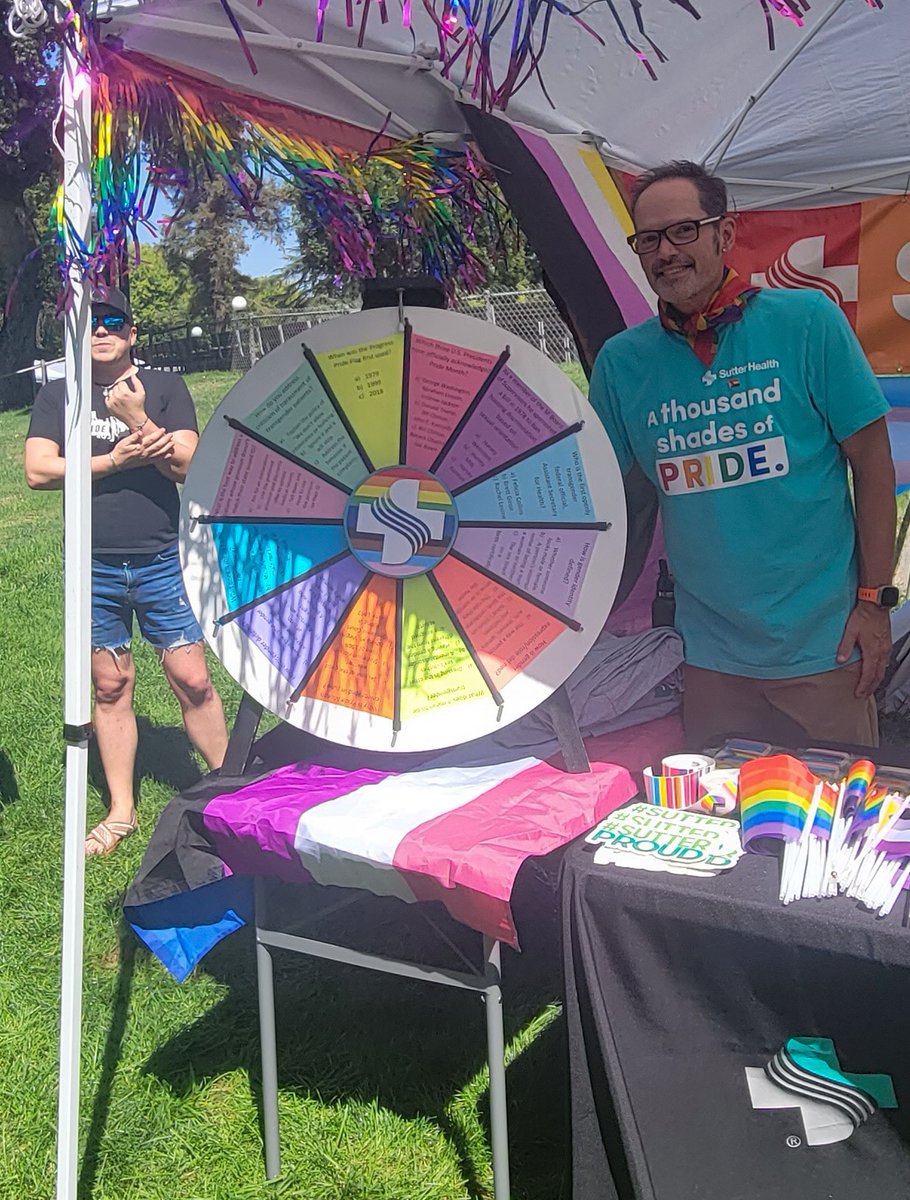 SutterHealth's tweet photo. What a beautiful day at #MoPride! We had a blast and our booth and trivia wheel were a hit. #TeamSutter passed out rainbow glasses, bracelets, stickers and tasty Pride flag cookies from a local baker. Thank you to everyone who joined us for the special day! https://t.co/cymufELo0p