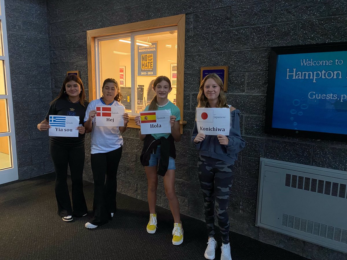This morning’s 🌧 ☔️didn’t stop our student leaders from greeting, welcoming, and offering a simple 😊 & 👋 in about 8 different languages! #StartWithHelloWeek is off to a great start! #WeAreHB 💜
