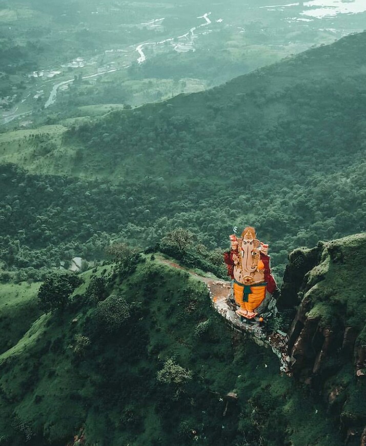 TAdventurousoul's tweet photo. Majestic Ganesha murti carved out of a single boulder amidst lush green hilltop of matheran 

#GaneshChaturthi2023 https://t.co/iCeRikDCfA