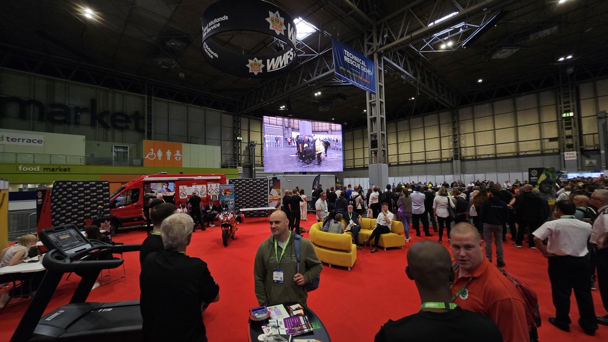 At a very busy <a href="/emergencyukshow/">The Emergency Services Show</a> with <a href="/WestMidsFire/">West Midlands Fire Service</a>. New branding looks sharp and <a href="/WMFSWestBrom/">West Bromwich Fire Station</a> are currently undertaking a live extrication demonstration for a rapt crowd. Health and Wellbeing, <a href="/WMFSRCRT/">WMFS RCRT</a>, Prevention and our search and rescue dog Luna