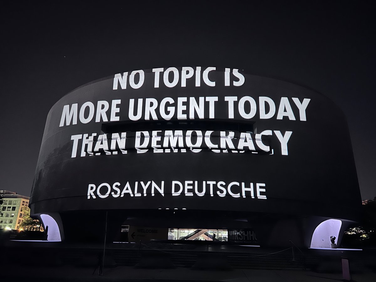 NO TOPIC IS MORE URGENT TODAY THAN DEMOCRACY Today on #DemocracyDay and #VoterRegistrationDay, we spotlight For Freedoms artist @jennyholzer's light projections titled, 'THE PEOPLE,' displayed on the facade of the @hirshhorn museum from dusk to 11 pm through September 21.