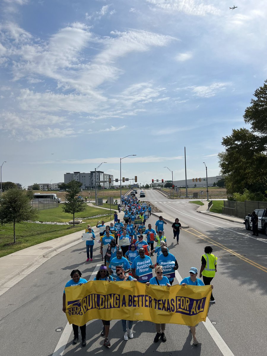 TexasAFLCIO's tweet photo. “Poverty doesn’t fly in TX!” @TexasAFLCIO joined @SEIUTX rally at @DFWAirport to demand living wages &amp; basic benefits for Airport service workers. We are FED UP that after working through a pandemic &amp; extreme heat, poverty wages persist. #1u (1 of 3) https://t.co/4iZ9WqVVkf