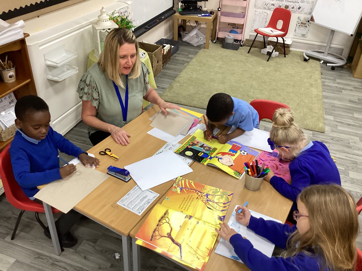 St_Benets's tweet photo. In Reception, we have been inspired by ‘Our Favourite 5’.Miss Wilkinson is showing us how to make our own books #EYFS #Pleasureforreading https://t.co/pJQgpoIv3k