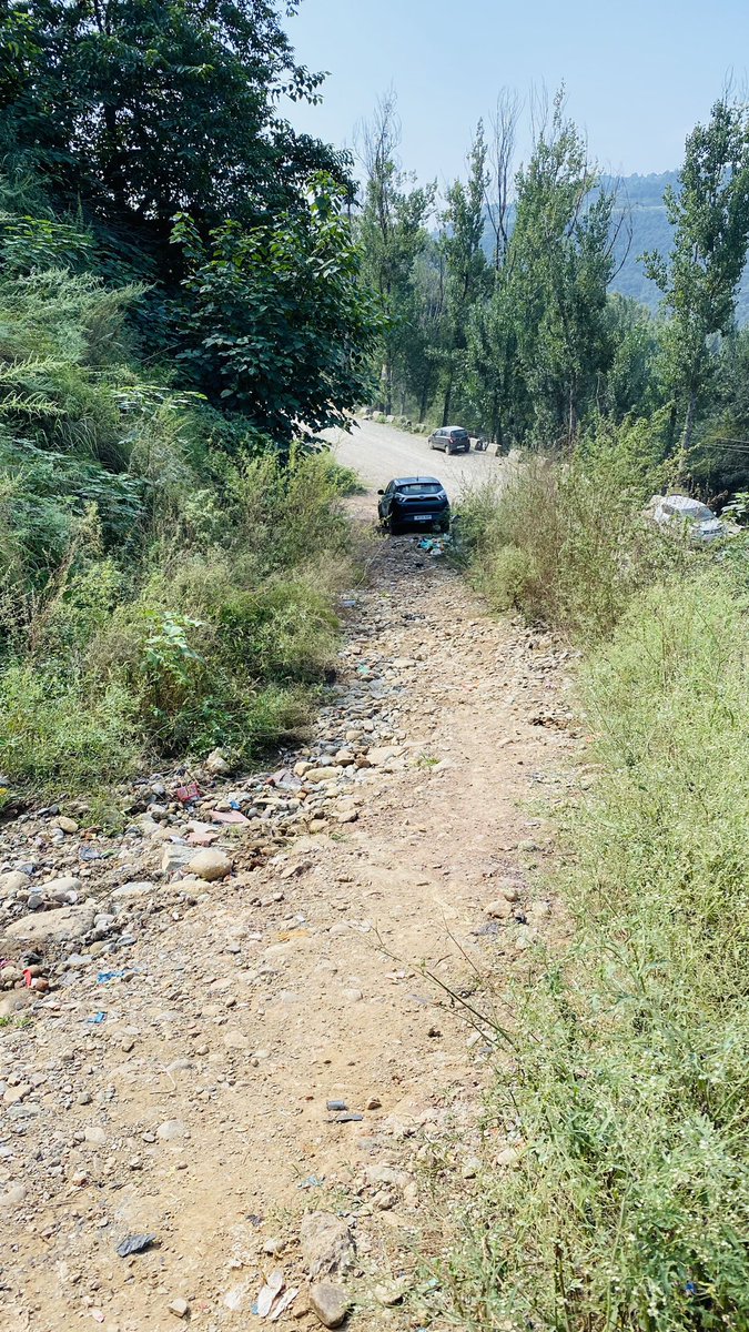 ahmed_shezzi's tweet photo. "🚧 Urgent attention needed! The road condition in Dhandihar near Bawali University turn, Rajouri, is absolutely deplorable. I had to rush my mother to the hospital yesterday evening due to her deteriorating health, and it was incredibly distressing. https://t.co/OpFAFlLDHj