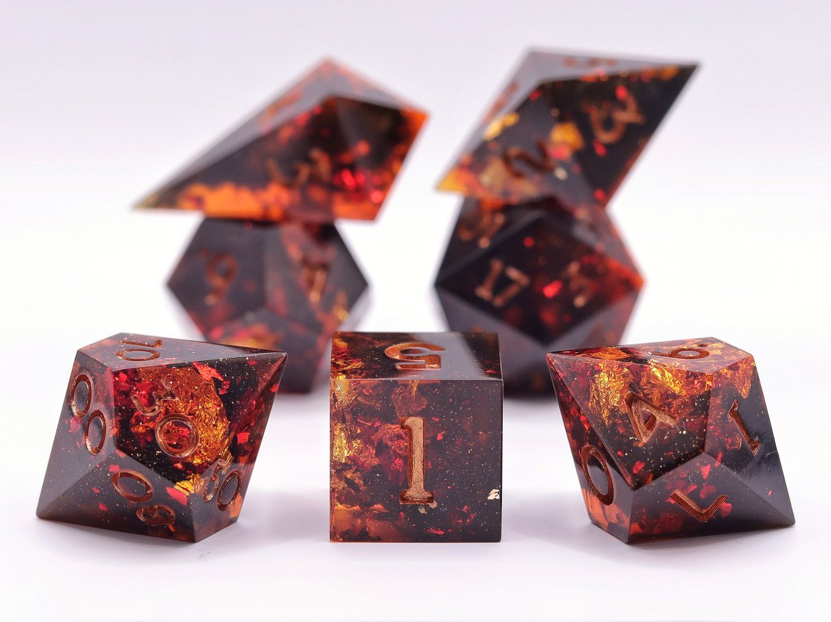 sleightofhandcr's tweet photo. Fire Within

They may look hot to the touch, but the incased ambers are well protected within these dice. Roll with advantage for any fire based spells and attacks. https://t.co/8Xbxb23wFZ