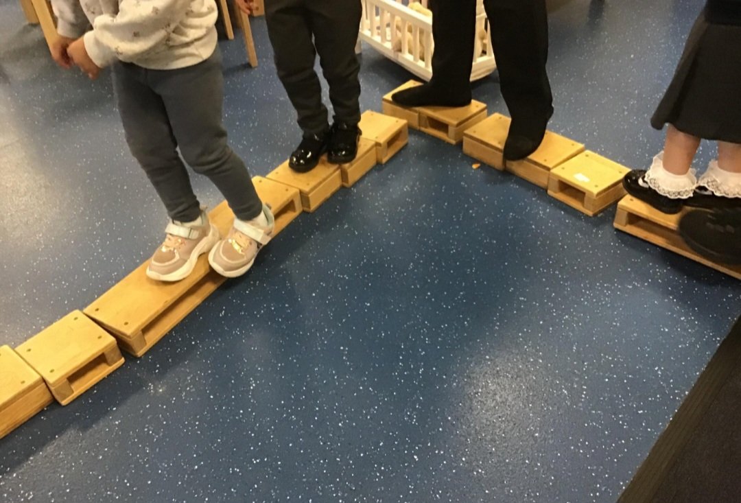Building and balancing using our gross motor skills in Nursery