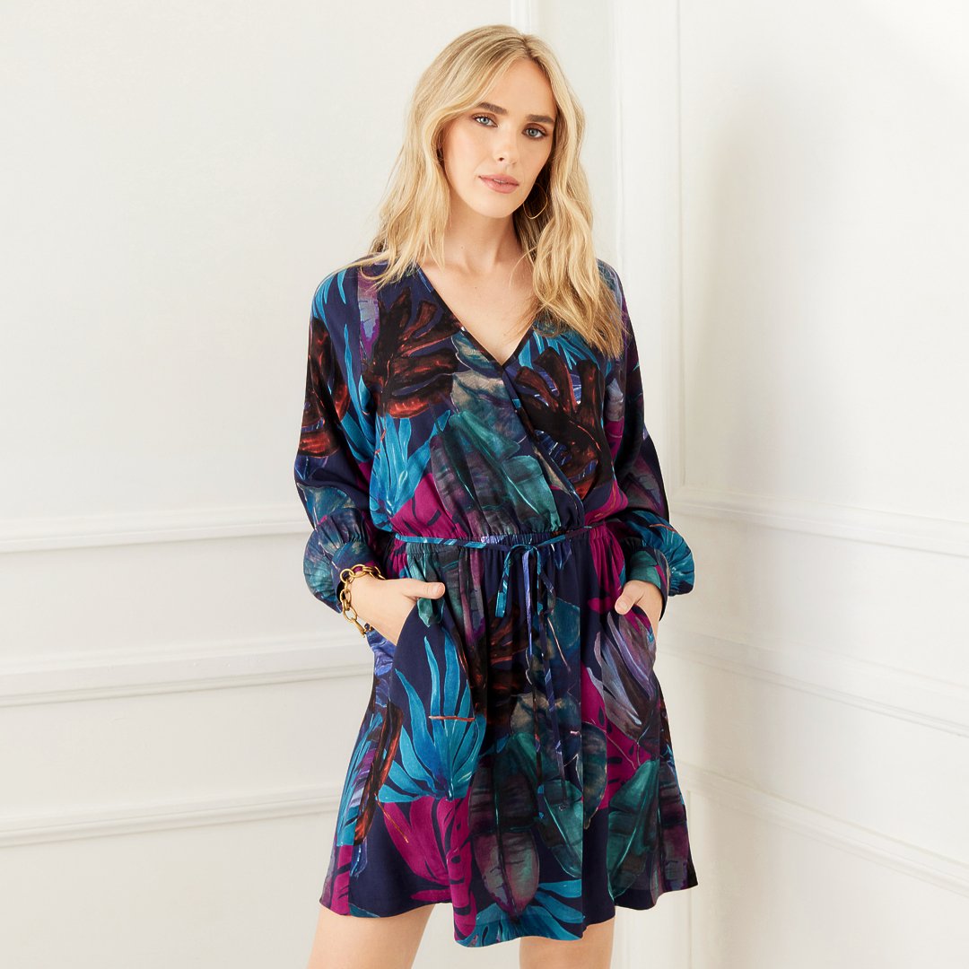 If you agree that there's nothing better than a dress with pockets... then our Long Sleeve Faux Wrap Dress is for you!