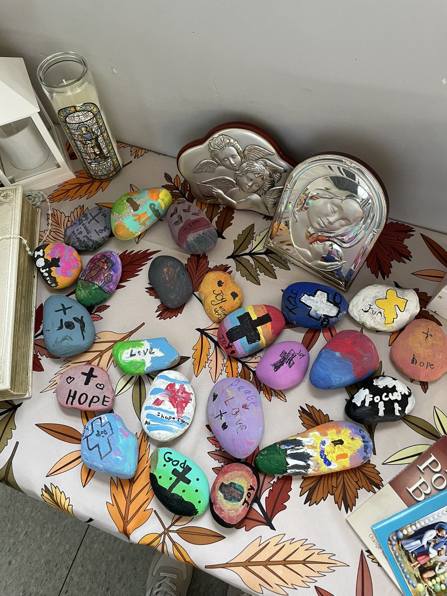 Students were given the task to paint a rock and write one word that represents their hopes and dreams for the school year. Such a beautiful addition to our prayer table!🪨🎨 <a href="/StAngelaWECDSB/">St. Angela WECDSB</a>