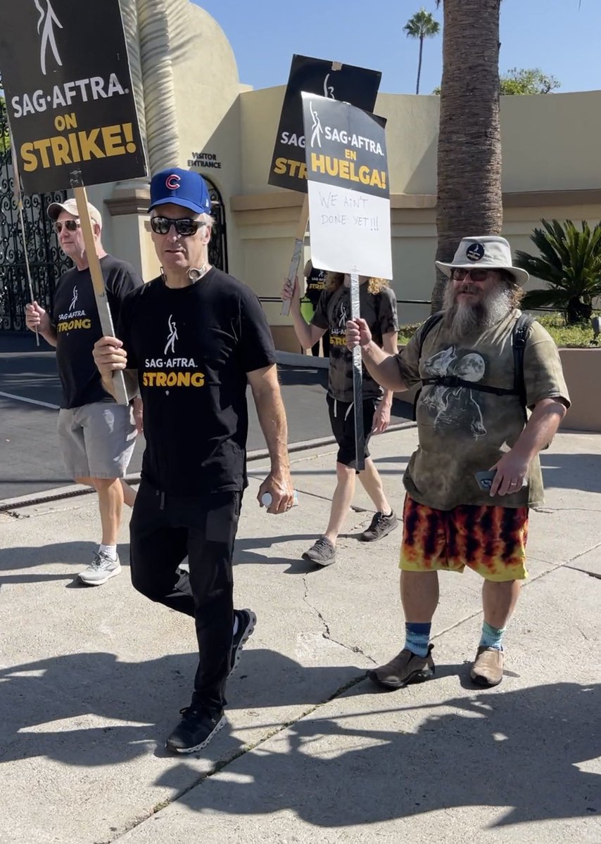 DylanTweetin's tweet photo. Bob Odenkirk &amp; Jack Black are the real deal. These rich + famous guys showed up to picket this morning and have been showing up regularly since July, showing solidarity w all the unknown, working class jobbers who make up the vast majority of SAG-AFTRA. Respect. #SagAftraStrong https://t.co/Ipn703l1ev