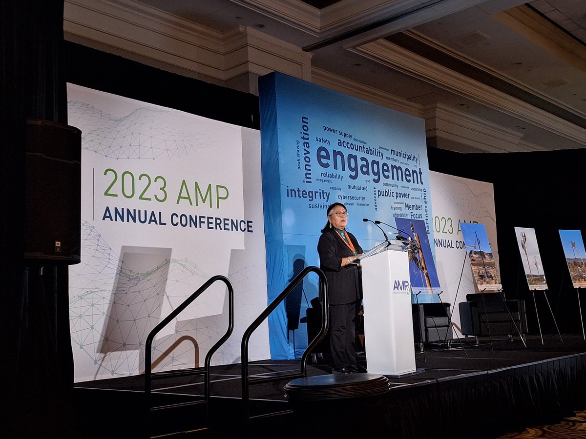 Deenise Becenti, government and public affairs manager for @NTUAUtilities, spoke about #LightUpNavajo during the AMP Awards Banquet. Deenise also announced mutual aid commendations to AMP members who participated in Light Up Navajo 2023 — DEMEC, @WvilleElectric and @HamiltonOh.