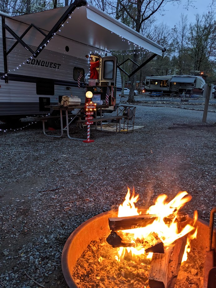 2023 Memories Made
From our April Trip to Monroe, VA. It was cool in the evenings and mornings, but the days were beautiful.
If you look close at the door, you can see Santa trying to get the TV to work for Mrs. C.

#SantaLovesCamping