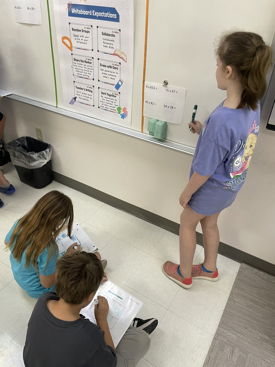 Vertical boards have become our favorite way to do math! I love seeing student work together and learn from each other! <a href="/RISgreatness/">RISD Intermediate</a> @thinkingclssrms