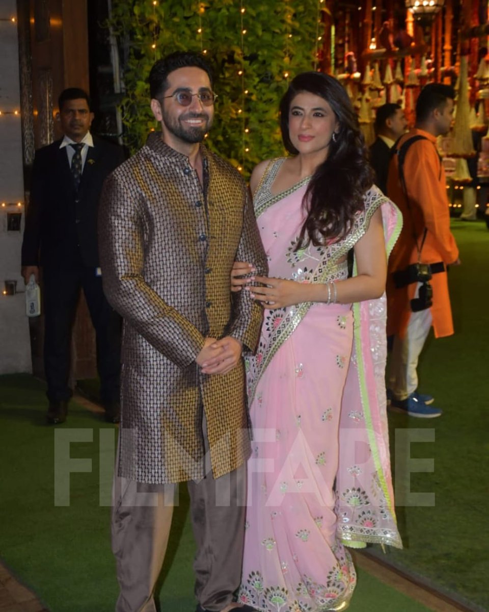 #AyushmannKhurrana and #TahiraKashyap smile for the cameras at the Ambani’s Ganesh Chaturthi celebration. 🌸