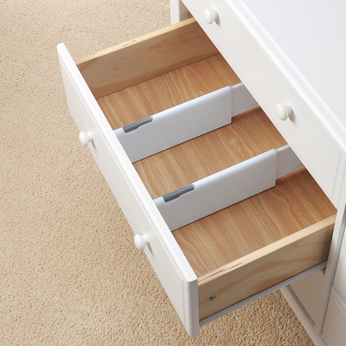 Organize your little one's drawers easily with our Expandable Drawer Set. These adjustable drawer dividers will expand or contract to fix most drawers so you can store all of your baby's things wherever you need! #OXOBetter