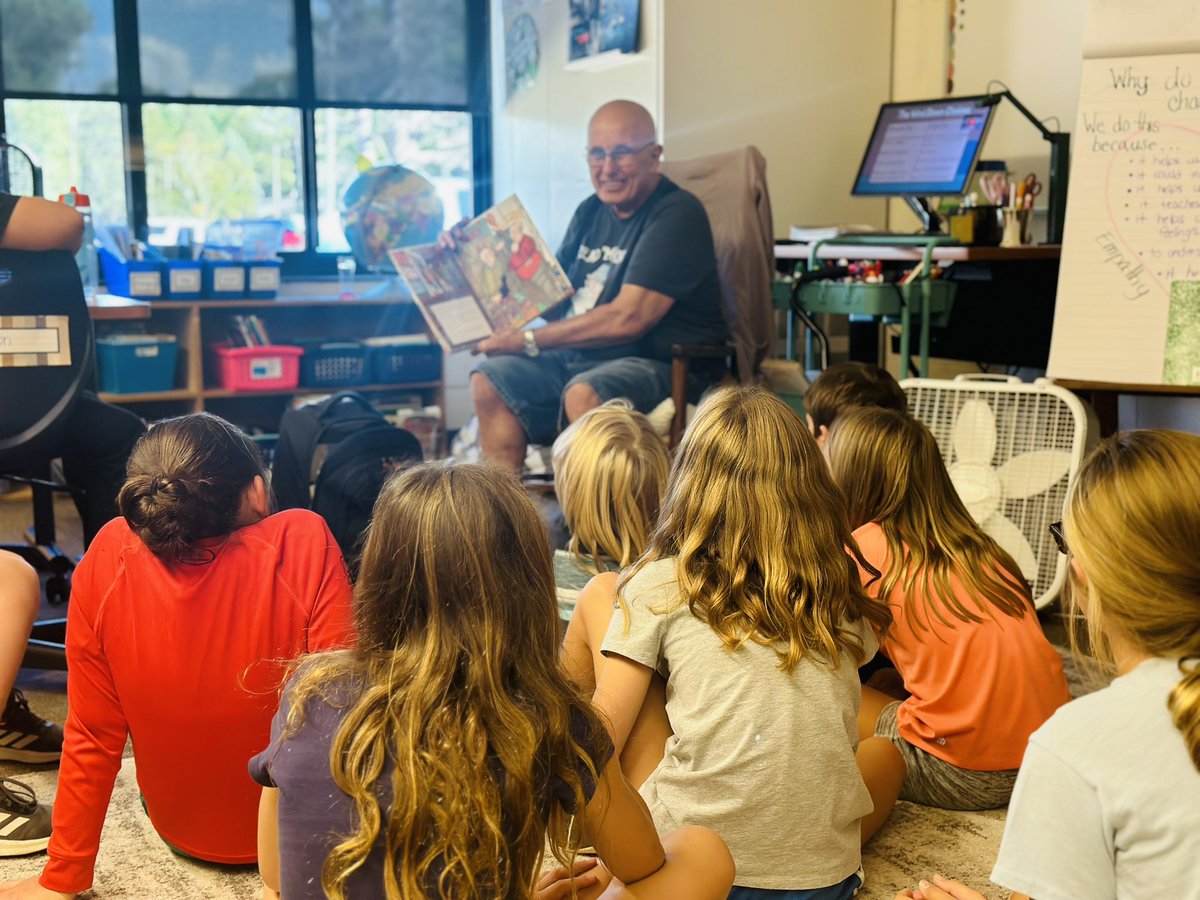 We adore our story time with Grandpa Gundy! All smiles!!