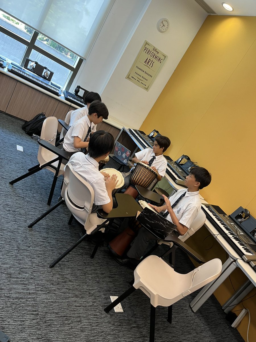 HarrowHKMusic's tweet photo. Year 8 enjoying their first topic of African Music. Collaborative small group work playing the Djembe. #music #djembe #prepmusic https://t.co/rNSr9rlWde
