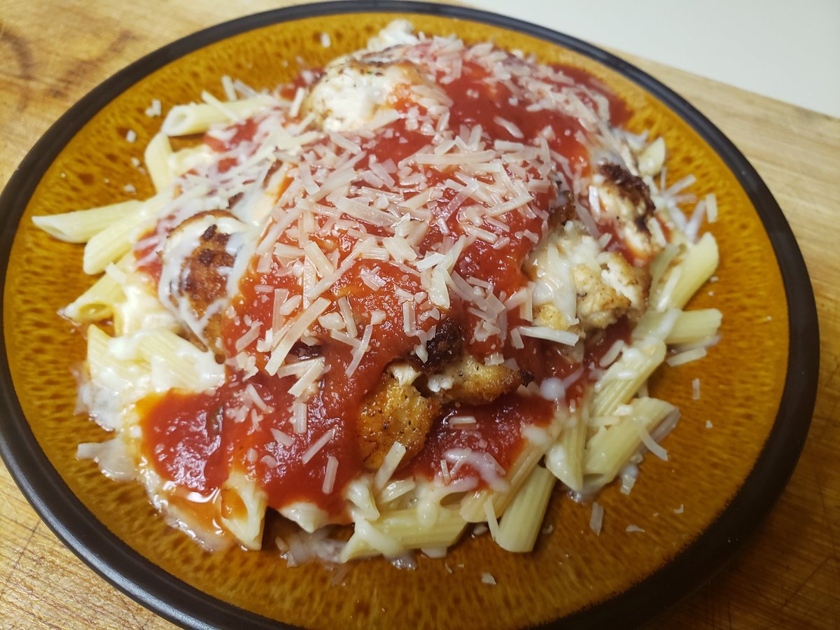 Quiet peaceful dinner for 1 tonight. Chicken Parmesan, quick easy and fresh. Been craving pasta so added a little cheesy goodness😋 #Pasta #ChickenParmesan #DinnerisServed