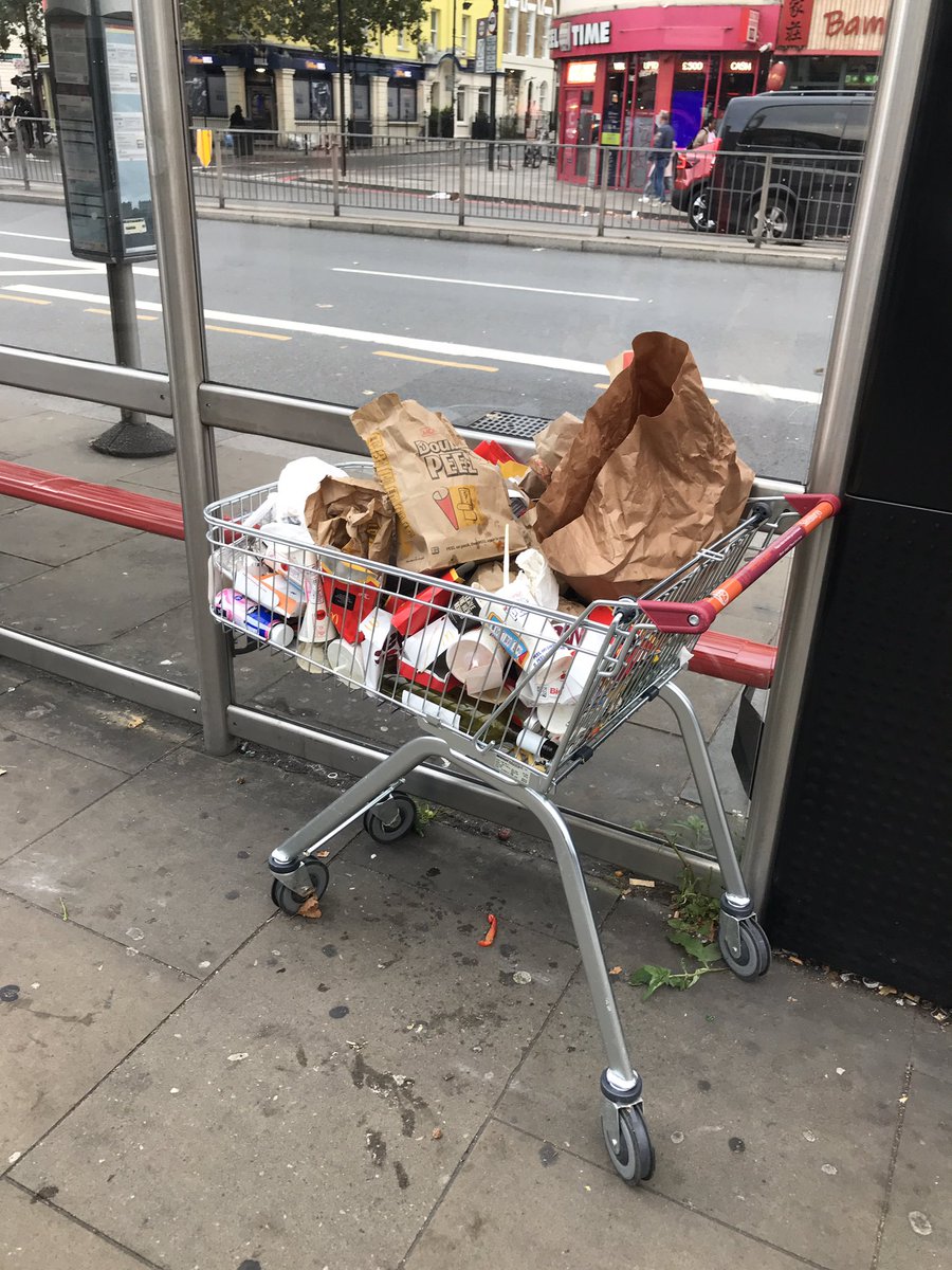 RuthEPunter's tweet photo. @CamdenCouncil can this shopping by trolley be removed from Kingscross behind bus stop E. It’s is being filled up with rubbish. https://t.co/6a4hOaN4oY