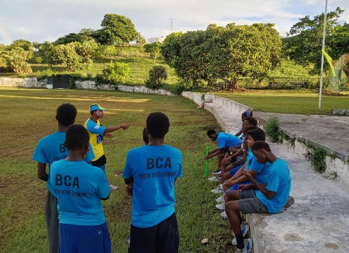 Debrief after an intense session with the under-15 boys