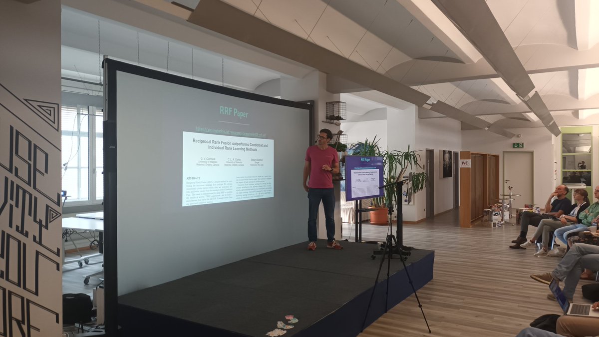 o19s's tweet image. Now @xeraa tells us about Reciprocal Rank Fusion, a way to combine rankings from different systems with #elasticsearch at #haystackconf