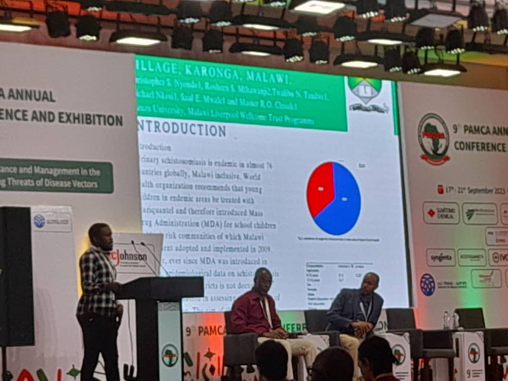 #PAMCA2023 Day 3. 

<a href="/ChrissNyondo/">CHRISS NYONDO</a> a BSc(hons) student from Malawi presenting on Schistosomiasis in Malawi this morning at the student poster competition.

Well done Chris!