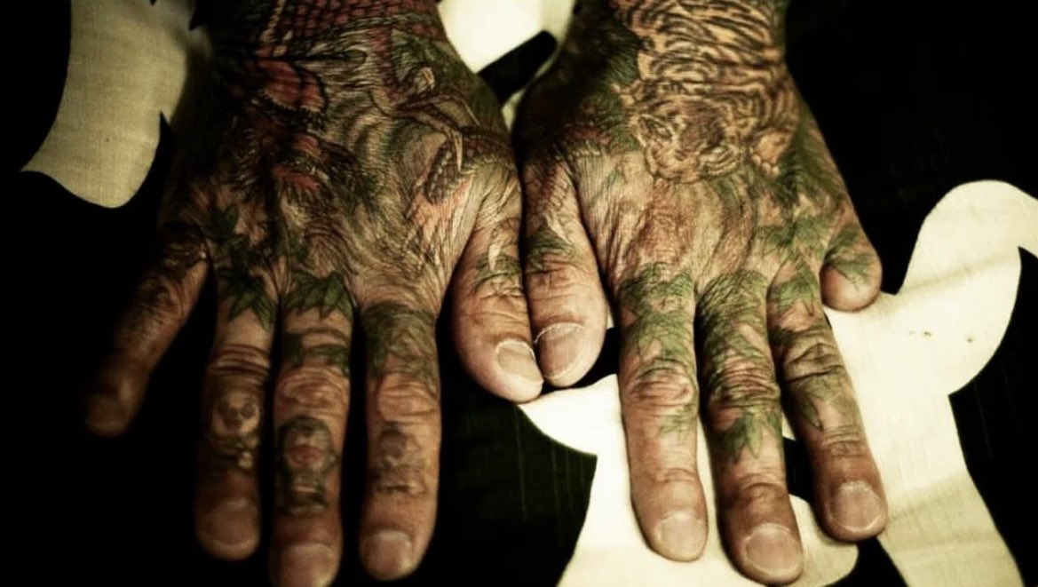 The hands of a member of the Yakuza, Japan's organized crime family. He’s missing some fingers  because they were sacrificed to restore honor.