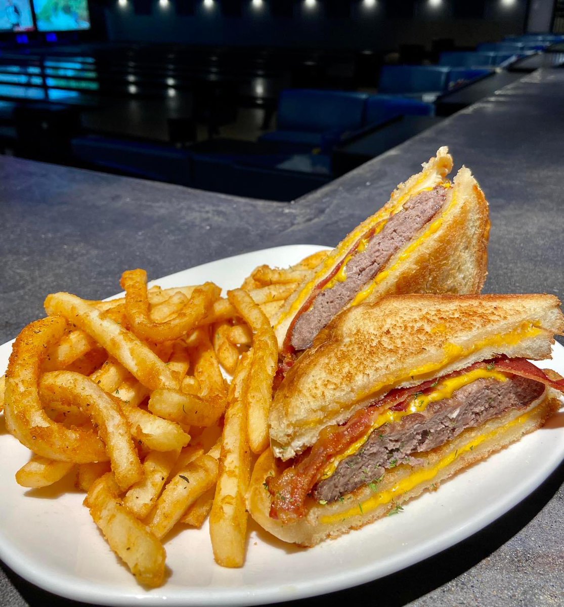 Today’s Special: Bacon Grilled Cheese Burger

Our classic burger topped with bacon and put between two grilled cheese sandwiches served with fries and choice of soft drink for $12.99