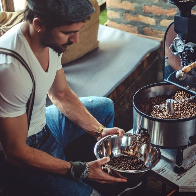 Look at the roastery's unsung hero, a watchful guardian of the roast. With each dishful of roasted coffee, he writes a new chapter in the coffee chronicle. For every bean that lands in his dish, there's a coffee lover's dream in the making. ☕📖 #coffee #roaster #cafe #morning