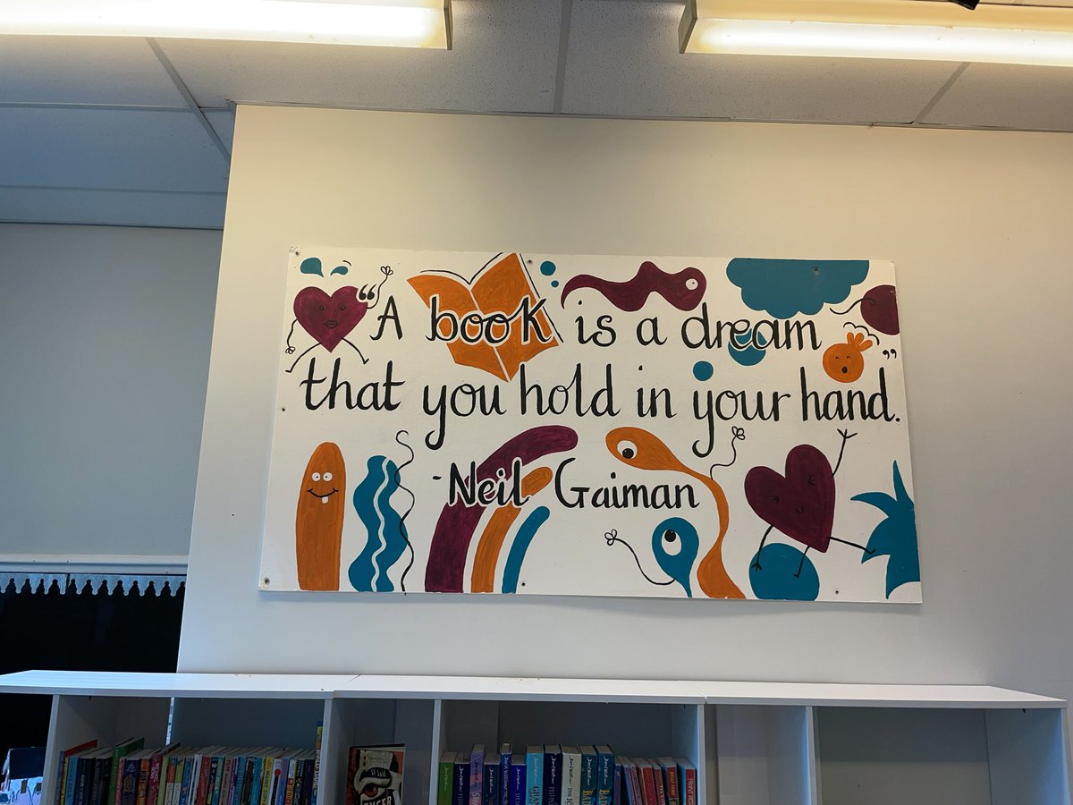 Our parents and carers are amazing! One mum has spent this week creating this amazing wall mural for our school library! #reading #library