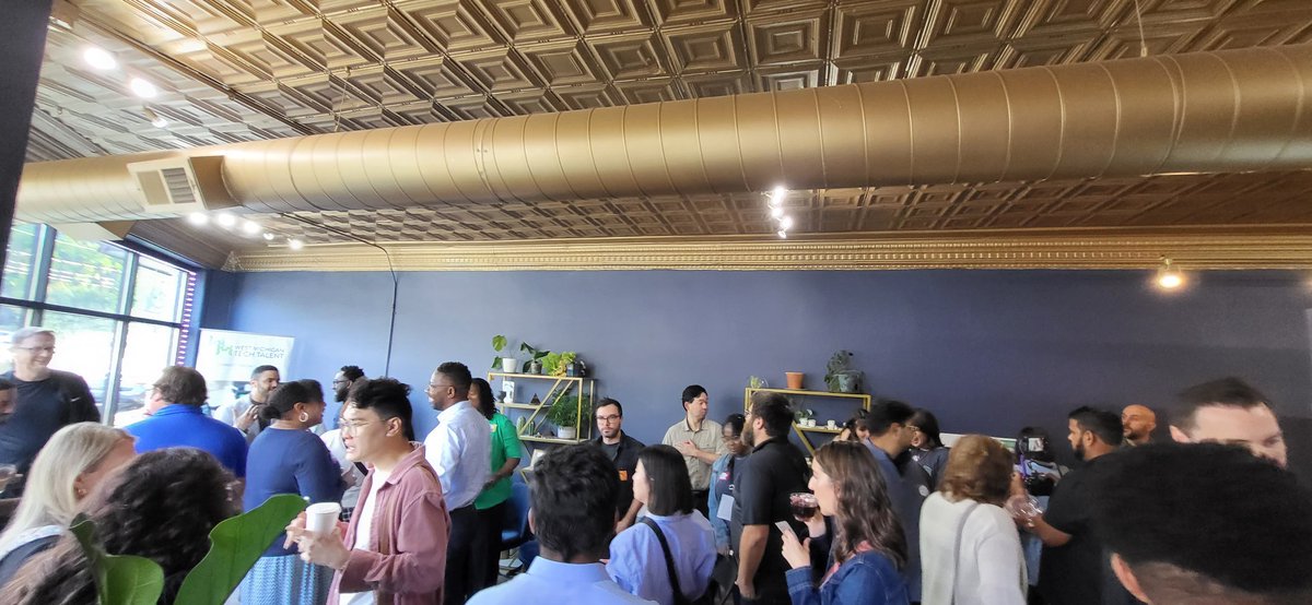 A fair amount of networking happening at <a href="/lastmilecafe/">lastmilecafe</a> for another successful Tech Week event!