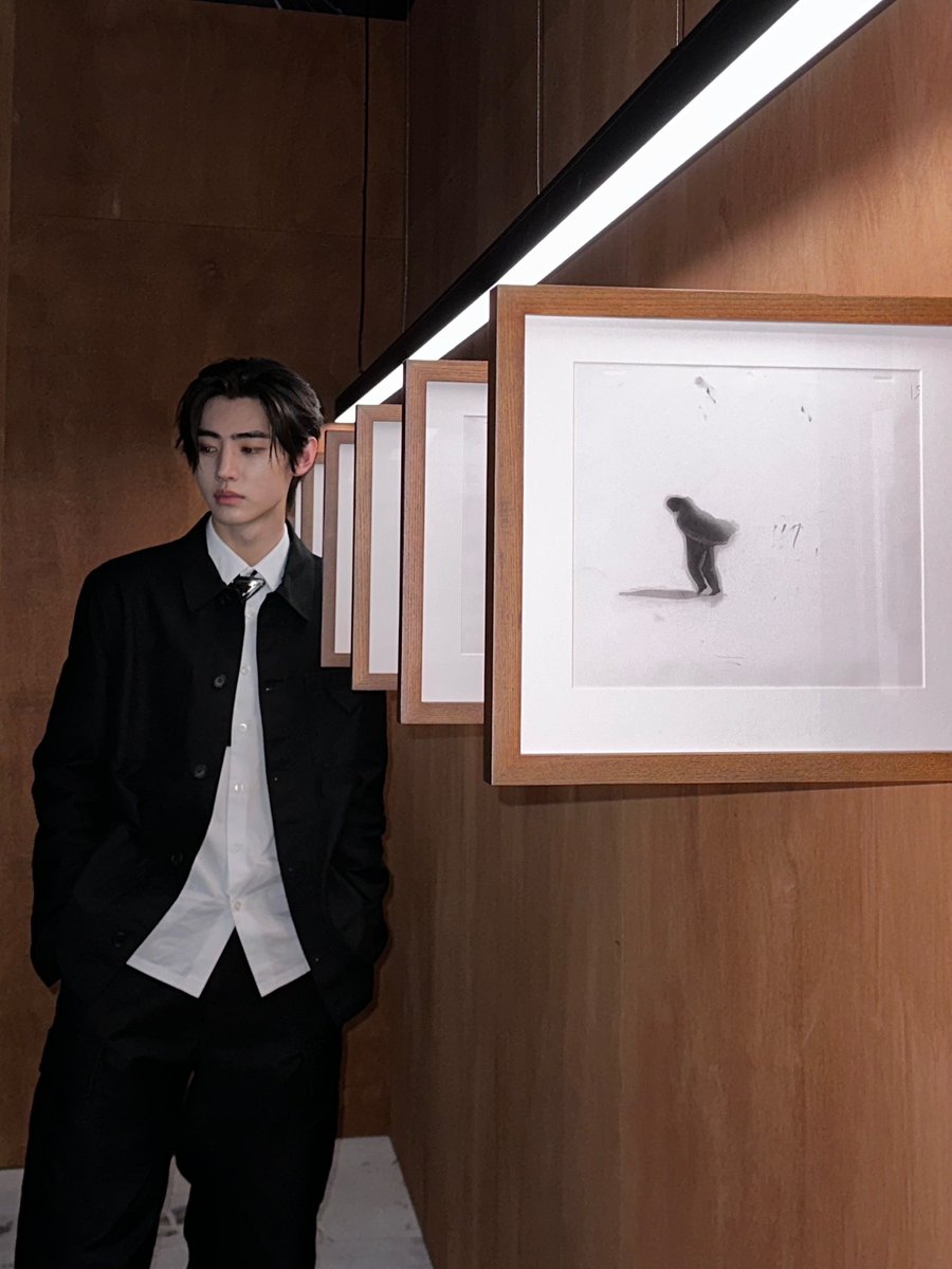 Stepping into Prada Mode with a runway-ready look, ready to embrace the world of fashion and art.