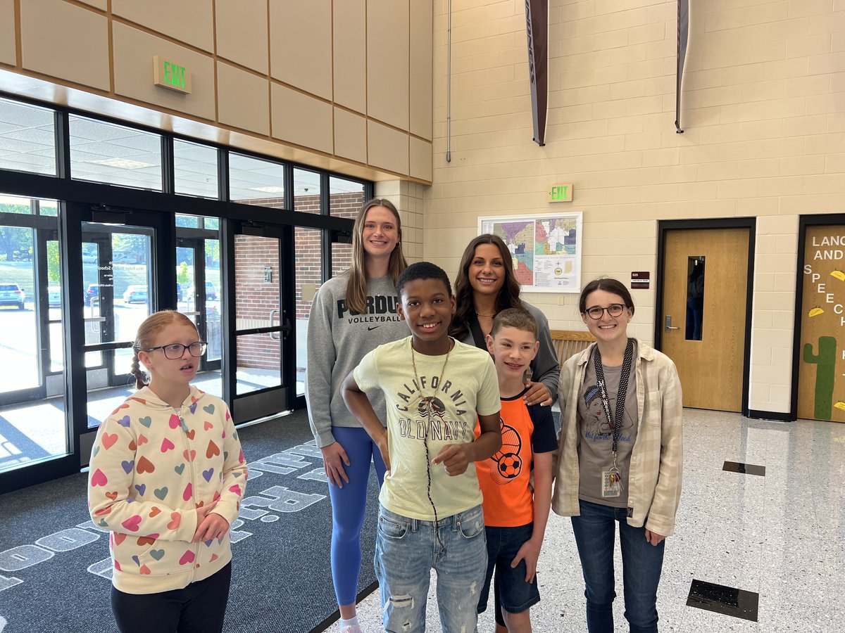 WeaRidgeMS's tweet photo. Great start to the day!  Thank you to @PurdueVB players Chloe and Emily for greeting our students as they entered the building this morning.  Great to welcome back one of WRM's all-time greats @ChicoineChloe.  Once a Husky, Always a Husky!
#StartWithHello 
@TSCSuper @eemilyras https://t.co/xYDWmywzYE