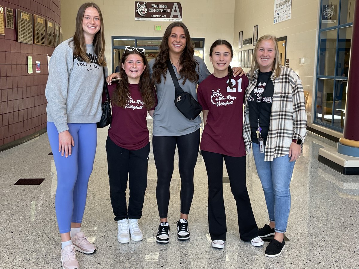 WeaRidgeMS's tweet photo. Great start to the day!  Thank you to @PurdueVB players Chloe and Emily for greeting our students as they entered the building this morning.  Great to welcome back one of WRM's all-time greats @ChicoineChloe.  Once a Husky, Always a Husky!
#StartWithHello 
@TSCSuper @eemilyras https://t.co/xYDWmywzYE
